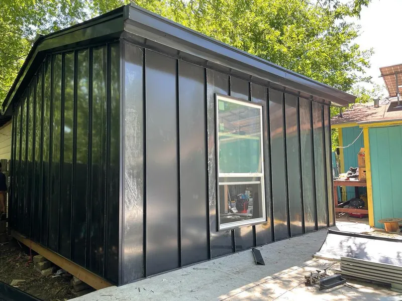 Black standing seam metal wall panels for Roof Inspection in Port Isabel